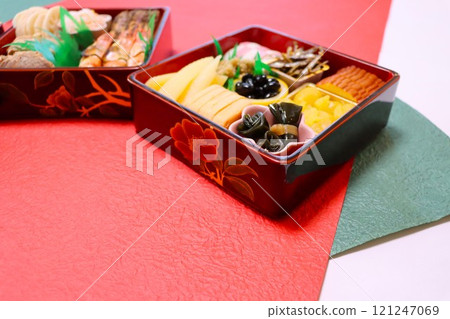 Homemade New Year's food packed in a tiered box - Close-up 121247069