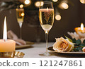 Champagne, roses and candles to celebrate Valentine's Day, birthday, Christmas, New Year, anniversary 121247861