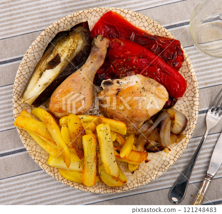 Chicken with stewed vegetables and potatoes 121248483