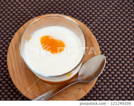 Yogurt with passion fruit marmalade Yogurt with passion fruit marmalade 121249109