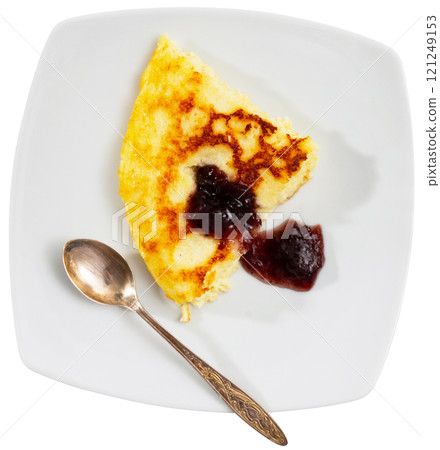 Cottage cheese casserole served with jam 121249153