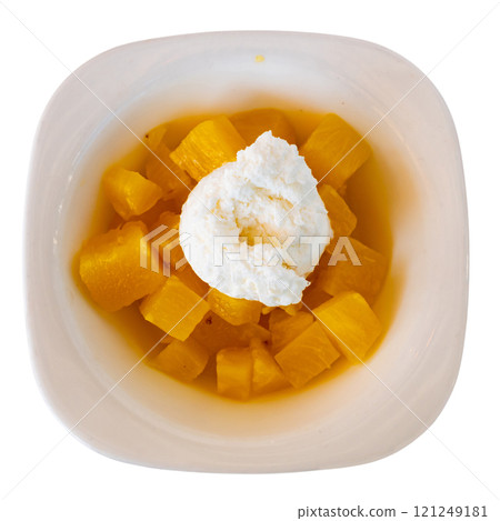 Juicy pineapple cubes with ice cream 121249181