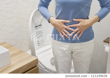 Woman defecation no face 121249636