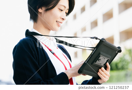 Female medical staff holding a tablet Female medical staff holding a tablet 121250237