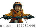 A young boy is wearing a helmet while riding a bike 121251449