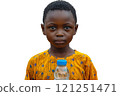 A young boy is happily holding a water bottle and smiling during an event 121251471