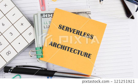 Concept words SERVERLESS ARCHITECTURE it is written on a sticker on the background of an open notebook 121251921