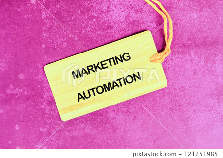Marketing automation tag on a colorful background highlighting its importance for businesses and efficiency strategies Marketing automation tag on a colorful background highlighting its importance for businesses and efficiency strategies 121251985