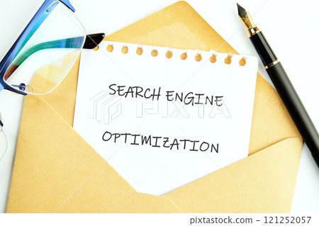 Business concept. Text SEARCH ENGINE OPTIMIZATION close-up, in a letter from an envelope 121252057