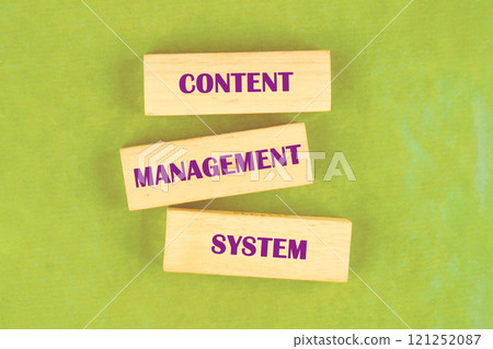 Understanding content management system concepts through building blocks on a green surface 121252087