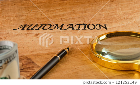 The concept of technology and development. Phrase, words, text AUTOMATION text API written on paper, front view The concept of technology and development. Phrase, words, text AUTOMATION text API written on paper, front view 121252149
