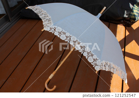 Elegant parasol with lace edging 121252547