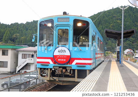 A train parked at Tarumi Station 121253436