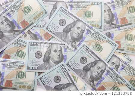 close up fiat money 100 usd banknotes on a white background. Pile of United States of America Finance. concepts of banking,cash, savings,fiat money concept,100 dollars. Money Mockup. 121253798
