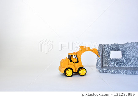 Image of a construction site where a building is being demolished with heavy machinery Image of a construction site where a building is being demolished with heavy machinery 121253999