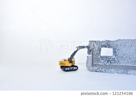 Image of a construction site where a building is being demolished with heavy machinery Image of a construction site where a building is being demolished with heavy machinery 121254186