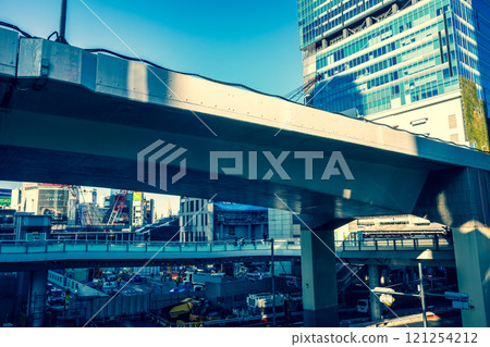 Tokyo Redevelopment Metropolitan Expressway and the West Exit of Shibuya Station under construction 2024.11 a-3 Emphasis on warm and cool colors 121254212