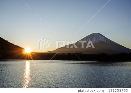 Early winter lake sunrise scenery 121255765