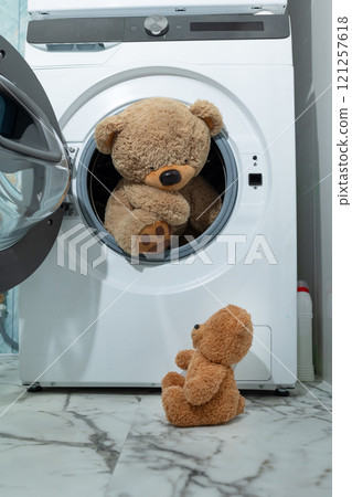 An Exciting Teddy Bear Adventure Inside the Washing Machine Full of Colorful Fun and Joy An Exciting Teddy Bear Adventure Inside the Washing Machine Full of Colorful Fun and Joy 121257618