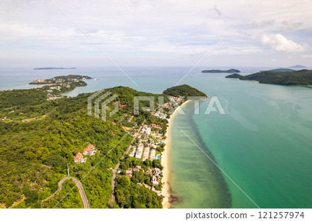 Aerial view of a blue sea surface water texture background,Sun reflections over ocean, Aerial flying drone view Waves water surface texture on sunny tropical ocean in Phuket island Thailand 121257974