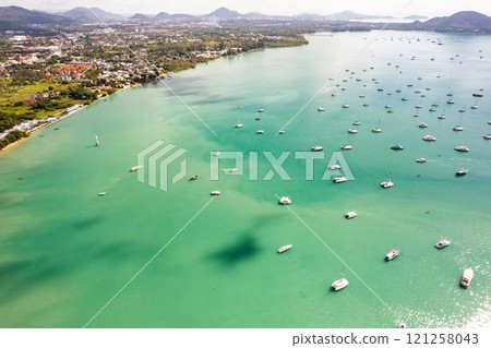Chalong pier with sailboats and other boats at the sea Top view frome drone camera,Phuket Thailand 121258043