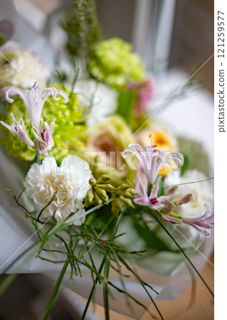 Vibrant Floral Arrangement Featuring a Variety of Colorful Blooms 121259577