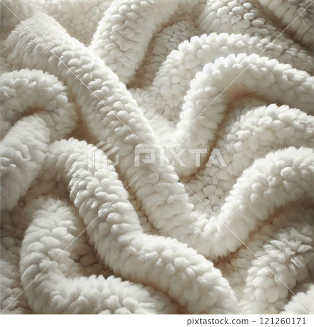 Soft white fluffy material arranged in a wavy undulating pattern creating a cozy inviting and luxurious texture 121260171