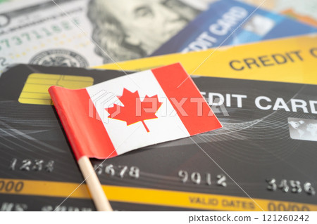 Canada flag on coin and banknote money, finance trading investment business currency. 121260242