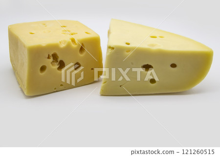 Delicious fresh hard cheese on a white background. Healty and very tasty cheese. 121260515