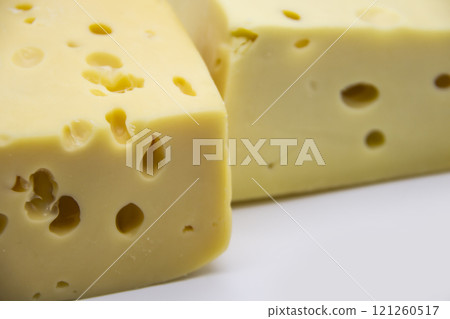 Delicious fresh hard cheese on a white background. Healty and very tasty cheese. 121260517