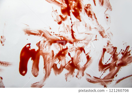 A smeared blood against white background. Bloody pattern. Concepts of blood can be used in design A smeared blood against white background. Bloody pattern. Concepts of blood can be used in design 121260706