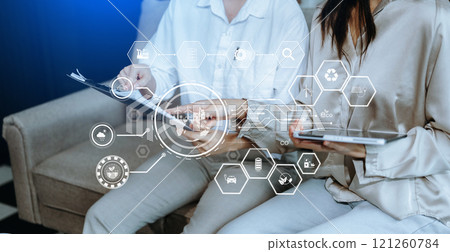 Business team working virtual modern smartphone to reduce CO2 emissions carbon footprint climate change to limit global warming 121260784