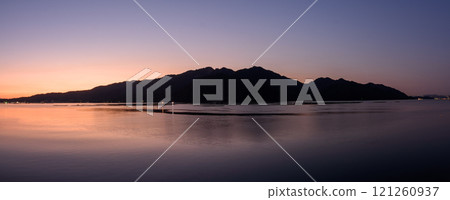 Panorama of the sacred Miyajima island, Itsukushima near Hiroshima in Japan at sunrise Panorama of the sacred Miyajima island, Itsukushima near Hiroshima in Japan at sunrise 121260937
