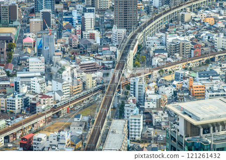 Downtown cityscape of Osaka, aerial view from Abeno Harukas skyscraper in Osaka, Japan Downtown cityscape of Osaka, aerial view from Abeno Harukas skyscraper in Osaka, Japan 121261432