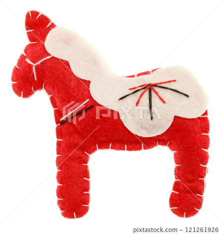 Handmade red and white felt horse toy with embroidery details isolated on white Handmade red and white felt horse toy with embroidery details isolated on white 121261926