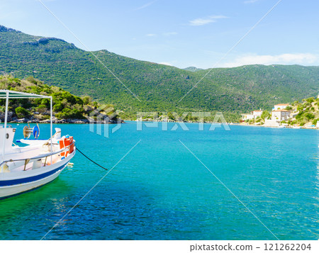 Jetty pier on coastline with boat yacht. Jetty pier on coastline with boat yacht. 121262204