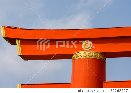 Close up details on a red Torii gate in famous Fushimi Inari Shinto shrine in Kyoto, Japan 121262327