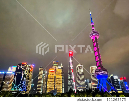 Shanghai Pudong New District illuminated at night Shanghai Pudong New District illuminated at night 121263575