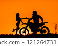 Silhouette of a girl and a man on a motorcycle.  121264731