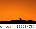Silhouette of a girl and a man on a motorcycle.  121264733
