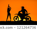 Silhouette of a girl and a man on a motorcycle.  121264736