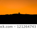 Silhouette of a girl and a man on a motorcycle.  121264743