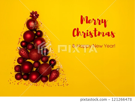 Christmas tree design with red ornaments on yellow background Christmas tree design with red ornaments on yellow background 121266478