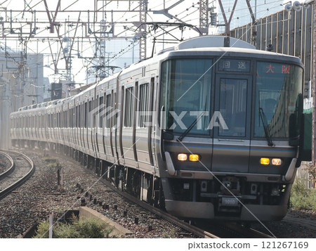 Series 223 (bound for Osaka!? W6) passing through Tsukamoto Station Series 223 (bound for Osaka!? W6) passing through Tsukamoto Station 121267169