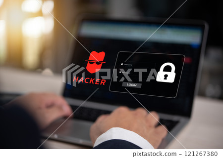 Cybersecurity concept with hacker icon and login screen on laptop 121267380