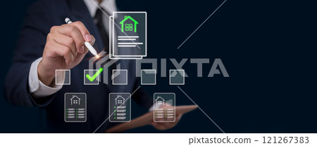 Businessman selecting real estate document with virtual interface Businessman selecting real estate document with virtual interface 121267383