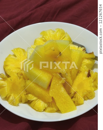 A vibrant platter of juicy watermelon and pineapple chunks A vibrant platter of juicy watermelon and pineapple chunks 121267654