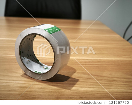 A roll of adhesive tape 121267730