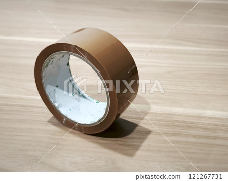 A roll of adhesive tape 121267731