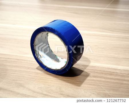 A roll of adhesive tape 121267732